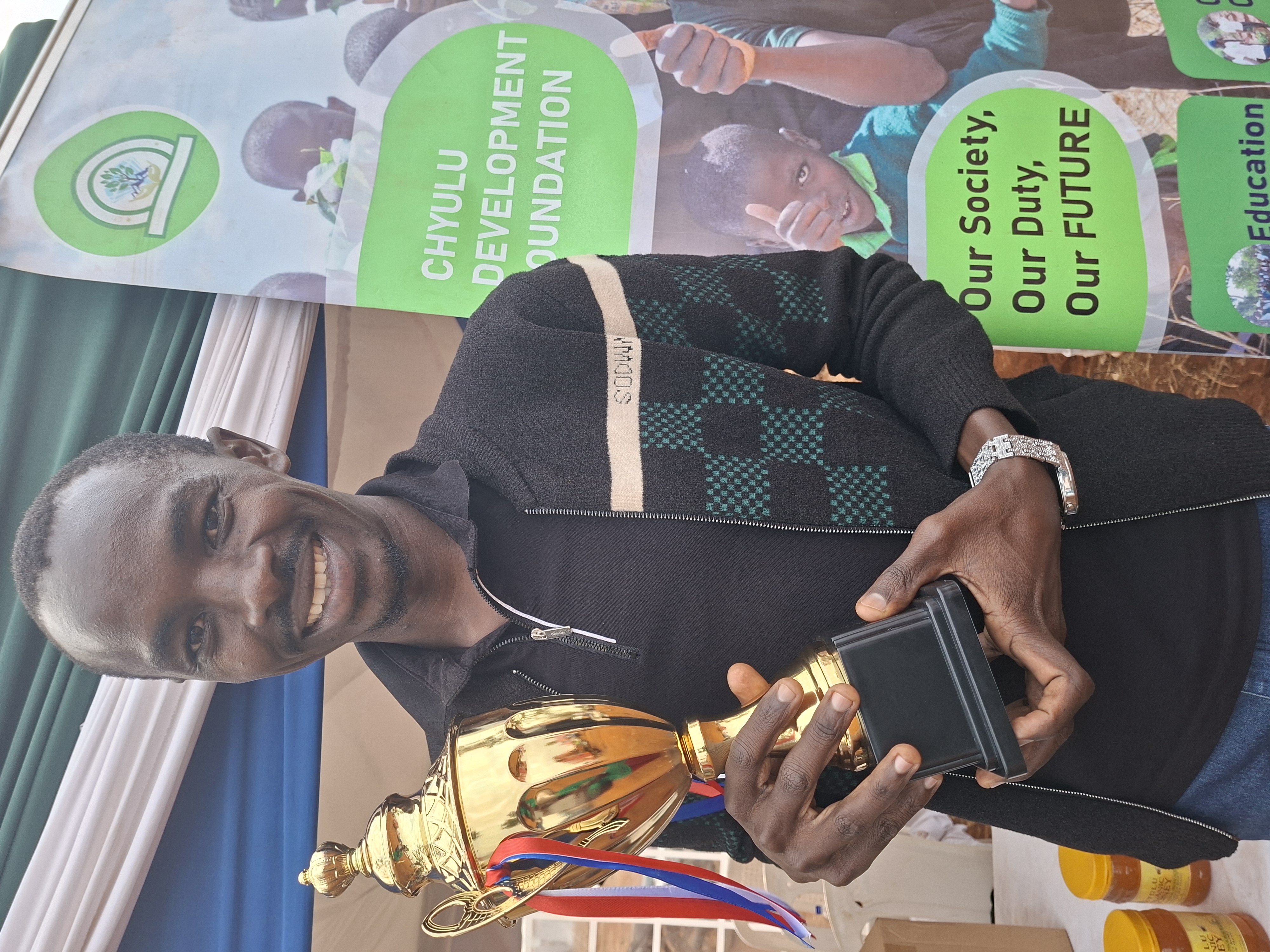 CEO Mr Harrison Mwololo celebrating the win