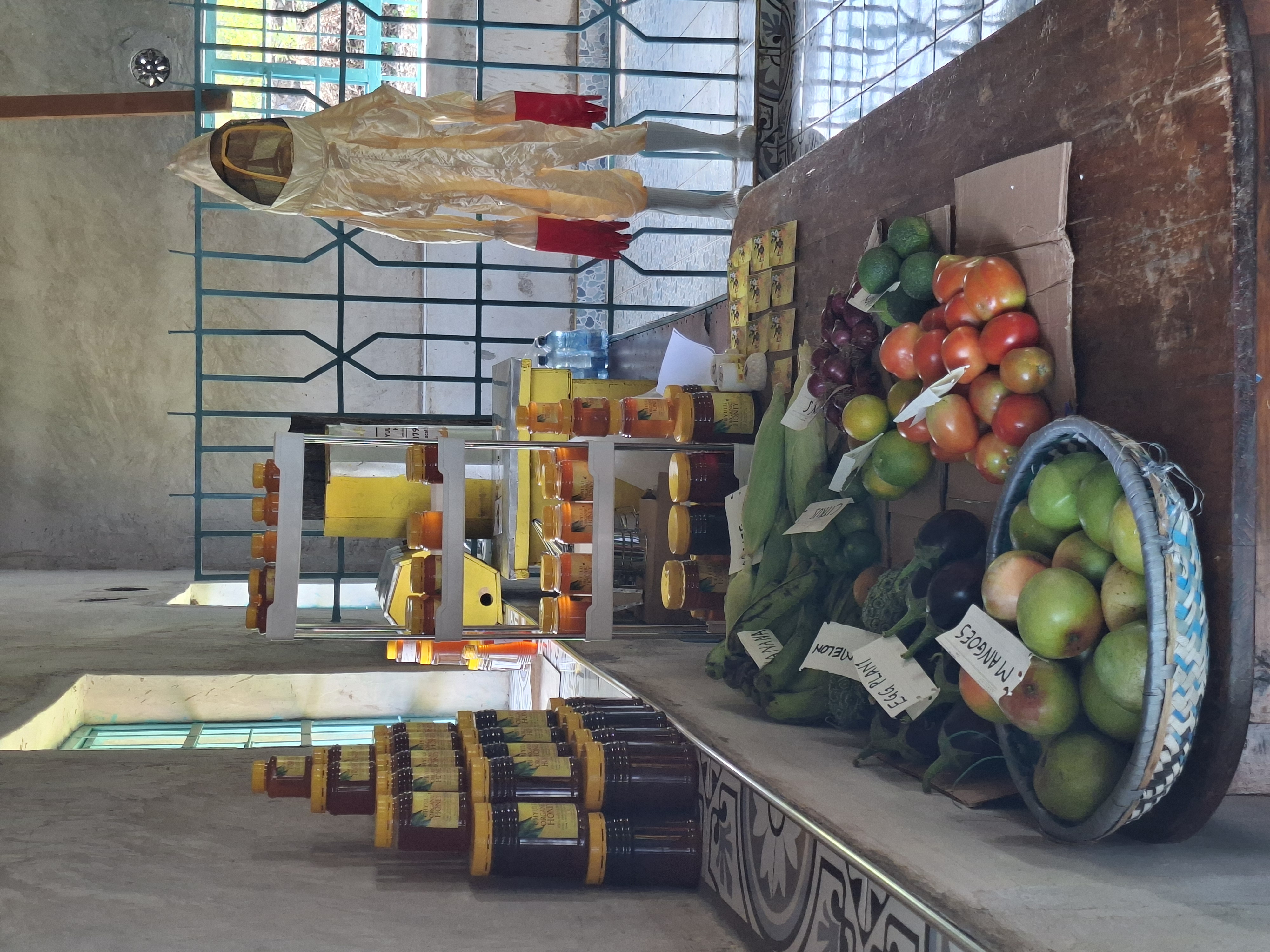 Exhibition table, showcasing honey and other integrated farm products from the farmers